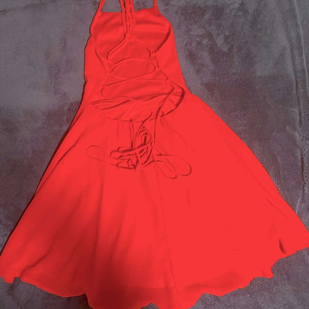 Sweet and summery lace-up backless orange dress.